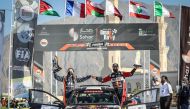 Nasser Saleh Al Attiyah and his co-driver Alba Sánchez González celebrate after winning the Oman Rally.