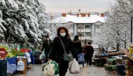 FILE PHOTO: People shop at a fresh market in Ankara, Turkey December 20, 2021. REUTERS/Cagla Gurdogan