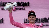 May 6, 2022 Alpecin-Fenix's Mathieu Van Der Poel celebrates on the podium wearing the maglia rosa jersey REUTERS/Bernadett Szabo