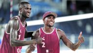 Qatar's Cherif Younousse and Ahmed Tijan.