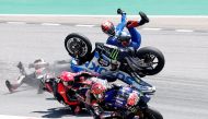 Team Suzuki Ecstar's Alex Rins crashes out at the start of the race REUTERS/Albert Gea TPX IMAGES OF THE DAY