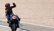 Monster Energy Yamaha MotoGP's Fabio Quartararo celebrates after winning the race. Reuters/Lisi Niesner