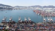 Containers are stacked up for outbound shipments at Gamman Pier in Busan.