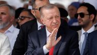 Turkish President Tayyip Erdogan waves to people during the opening of a mosque in Sisak, Croatia, on September 8, 2022. (REUTERS/Antonio Bronic)
