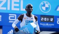 Kenya's Eliud Kipchoge celebrates as he wins the Berlin Marathon and breaks the World Record Reuters/Fabrizio Bensch