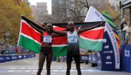 Kenya's Sharon Lokedi and Kenya's Evans Chebet pose after winning the elite women's race and elite men's race respectively at the 2022 TCS New York City marathon in New York, US, November 6, 2022. (REUTERS/Andrew Kelly)