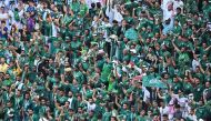 Saudi Arabia fans celebrate their team’s victory in the FIFA World Cup Qatar 2022 Group C match against Argentina at the Lusail Stadium, yesterday. (Reuters)