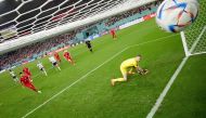 Iran’s Mehdi Taremi scores their second goal from the penalty spot past England’s Jordan Pickford. REUTERS