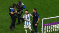 Argentina's Lionel Messi and coach Lionel Scaloni celebrate after the match as Argentina progress to the final Reuters/Paul Childs