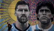 A mural depicting Argentine football stars Lionel Messi (left) and late Diego Maradona in Buenos Aires. AFP