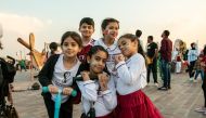 Children enjoying National Day festivities at Katara.