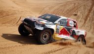 Nasser Saleh Al Attiyah and co-driver Matthieu Baumel in action during Stage 3 of Dakar Rally in this January 4, 2022 file photo.  