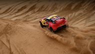 BRX's French driver Sebastien Loeb and Belgian co-driver Fabian Lurquin compete during Stage 8 of the Dakar 2023 between Al Duwadimi and Riyadh, Saudi Arabia, on January 8, 2023. (Photo by FRANCK FIFE / AFP)