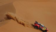 Bahrain Raid Xtreme's Sebastien Loeb and co-driver Fabian Lurquin in action during stage 12 REUTERS/Hamad I Mohammed