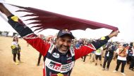 Toyota Gazoo Racing's Nasser Al-Attiyah celebrates his victory after winning the Dakar Rally 2023. (Reuters/Hamad I Mohammed)