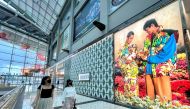 Visitors walk past a Gucci store at Marina Bay Sands in Singapore January 19, 2023. (REUTERS/Chen Lin)