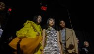 Models wearing creations by Proenza Schouler gather backstage prior to their runway show during New York Fashion Week on February 11, 2023. (Photo by Ed JONES / AFP)