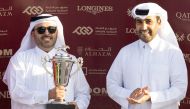 QREC Chairman Issa bin Mohammed Al Mohannadi crowned winners of the Premium Maiden Cup. PICTURES: JUHAIM/QREC