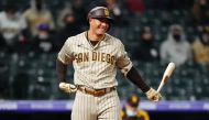 May 11, 2021; Denver, Colorado, USA; San Diego Padres third baseman Manny Machado (13) reacts in the eighth inning against the Colorado Rockies at Coors Field. Mandatory Credit: Ron Chenoy-USA TODAY Sports