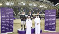 The podium winners of CSI 5*1.50m Marcus Ehning (centre),  Francisco Jose Mesquita Musa (left) and Kevin Staut pose with the officials. PICTURES: CHI Al Shaqab
