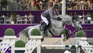 Christian Kukuk and grey stallion Mumbai in action at Longines Outdoor Arena at Al Shaqab yesterday. PICS: CHI Al Shaqab   