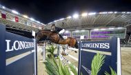 Germany’s Marcus Ehning guides Stargold over an obstacle during the Commercial Bank CHI Al Shaqab Grand Prix presented by Longines, yesterday.