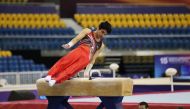 Rakan Al Harith of Qatar in action during the pommel horse round at Aspire Dome in Doha yesterday. Pic: Salim Matramkot/The Peninsula