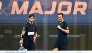 Carlos Daniel Gutierrez and Fernando Belasteguin celebrate after scoring a point during the semi-final.