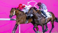 High And Wide under Tomas Lukasek outpaces Lauded, ridden by Faleh Bughanaim yesterday. PICS: Juhaim/QREC