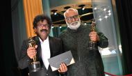 In this handout photo provided by the Academy of Motion Picture Arts and Sciences (AMPAS) Indian lyricist Chanrabose and Indian musical composer M.M. Keeravaani hold the Oscar for Best Music (Original Song) for their song 