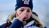 Marte Olsbu Roiseland wipes a tear during a press conference in Oslo , on March 14, 2023. Photo by Rodrigo Freitas and Rodrigo FREITAS / NTB / AFP