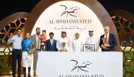 H H Sheikh Mohammed bin Khalifa Al Thani crowned the winners of the feature race at Al Rayyan Racecourse yesterday. PICS: Juhaim/QREC