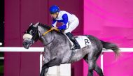 Soufiane Saadi astride Tajamhor during the feature at  Al Rayyan Racecourse on Wednesday night.
PIC: Juhaim/QREC