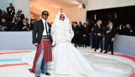 US rapper A$AP Rocky (L) and Barbadian singer/actress Rihanna arrive for the 2023 Met Gala. (Photo by Angela Weiss / AFP)