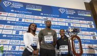 British sprinter Dina Asher-Smith, reigning world 100m champion Fred Kerley of the US and Kenya’s two-time Olympic and world champion Faith Kipyegon pose for a photograph after a press conference held in Doha, yesterday. Pic: Mohamed Farag