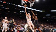 Nikola Jokic #15 of the Denver Nuggets drives to the basket during the first quarter against the Phoenix Suns in game six of the Western Conference Semifinal Playoffs at Footprint Center on May 11, 2023 in Phoenix, Arizona. (Photo by Christian Petersen / GETTY IMAGES NORTH AMERICA / Getty Images via AFP)