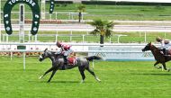 Jockey Olivier Peslier (left) guides Al Doha to victory in the Gr2 PA Qatar Prix de l’Élevage, in Toulouse, France.