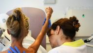 File Photo: A patient is pictured before a mammography at the Paoli-Calmette cancer institute in France in 2017. (Photo by Anne-Christine Poujoulat)