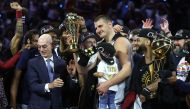 Nikola Jokic #15 of the Denver Nuggets is presented the Bill Russell NBA Finals Most Valuable Player Award after a 94-89 victory against the Miami Heat in Game Five of the 2023 NBA Finals to win the NBA Championship at Ball Arena on June 12, 2023 in Denver, Colorado.  Photo by MATTHEW STOCKMAN /  AFP
