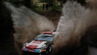 France's Sebastien Ogier and co-driver France's Vincent Landais steer their Toyota GR Yaris Rally1 Hybrid during the WRC Safari Rally Kenya, part of the FIA World Rally Championship, in Nakuru, Kenya, on June 24, 2023. (Photo by Yasuyoshi Chiba / AFP)