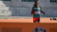 Ethiopia's Amane Beriso Shankule races to the finish line in the women's marathon final during the World Athletics Championships in Budapest on August 26, 2023. (Photo by Andrej Isakovic / AFP)