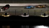  Ryan Preece, driver of the #41 RaceChoice.com Ford, flips after an on-track incident during the NASCAR Cup Series Coke Zero Sugar 400 at Daytona International Speedway on August 26, 2023 in Daytona Beach, Florida. Sean Gardner/Getty Images/AFP (Photo by Sean Gardner / GETTY IMAGES NORTH AMERICA / Getty Images via AFP)
