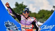 Winner Prima Pramac's Spanish rider Jorge Martin celebrates on the podium after the MotoGP Thailand Grand Prix at the Buriram International Circuit in Buriram on October 29, 2023. Photo by Lillian SUWANRUMPHA / AFP