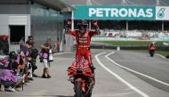 Winner Ducati Lenovo Team's Italian rider Enea Bastianini celebrates after the MotoGP Malaysian Grand Prix at the Sepang International Circuit in Sepang on November 12, 2023. Photo by MOHD RASFAN / AFP