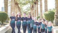 The students in a group photo at the event in Dubai.