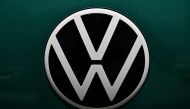 The logo of German car giant Volkswagen (VW) is pictured on a Volkswagen ID Buzz van during the company's annual press conference to present the business report, on March 14, 2023 in Berlin. Photo by John MACDOUGALL / AFP

