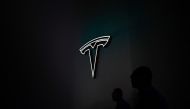 The Tesla logo is seen during the World Artificial Intelligence Conference (WAIC) in Shanghai on July 7, 2023. Photo by WANG Zhao / AFP