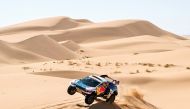 Nasser Racing’s Qatari driver Nasser Al Attiyah and his French co-driver Mathieu Baumel compete during Stage 3 of the Dakar Rally 2024. AFP