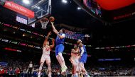 Luka Doncic #77 of the Dallas Mavericks goes up for a shot against Bogdan Bogdanovic #13 of the Atlanta Hawks during the first quarter at State Farm Arena on January 26, 2024 in Atlanta, Georgia. (Photo by Todd Kirkland / GETTY IMAGES NORTH AMERICA / Getty Images via AFP)
