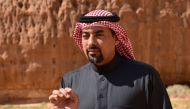 Amr bin Saleh Abdulrahman al-Madani, Saudi CEO of the Royal Commission for AlUla in the northwestern Medina region, speaks to an employee while touring the Sharaan Nature Reserve near the town of al-Ula in northwestern Saudi Arabia on February 11, 2019. Photo by FAYEZ NURELDINE / AFP